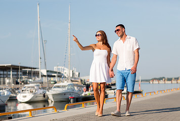 Image showing smiling couple in city