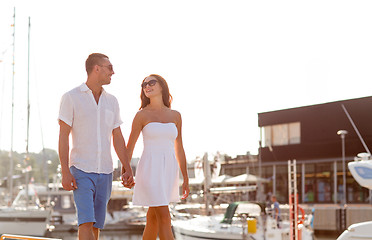 Image showing smiling couple in city