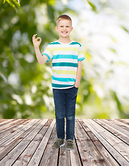 Image showing smiling little boy showing ok sign