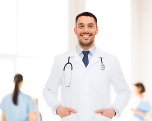 Image showing smiling male doctor with stethoscope