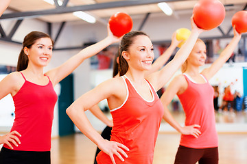 Image showing group of people working out with stability balls