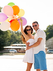 Image showing smiling couple in city