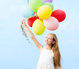 Image showing happy girl with colorful balloons