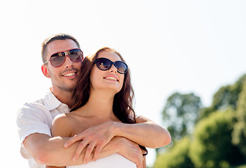 Image showing smiling couple in city