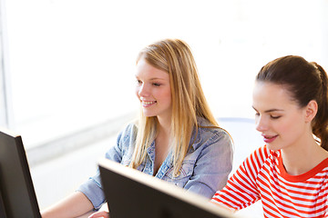 Image showing two smiling girls in computer class