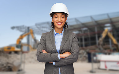 Image showing african american businesswoman in white helmet