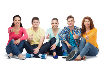 Image showing group of smiling teenagers showing thumbs up