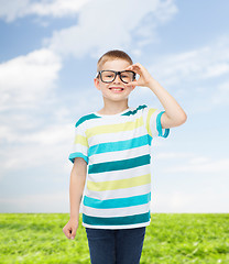 Image showing smiling little boy in eyeglasses