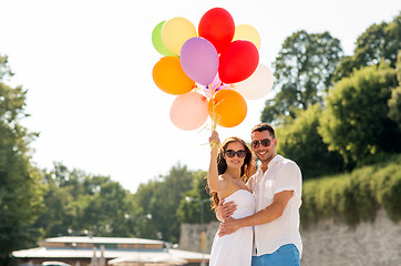 Image showing smiling couple in city