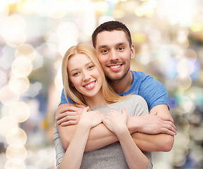 Image showing smiling couple hugging