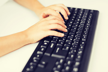 Image showing student girls hands typing on keyboard