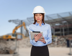 Image showing businesswoman in white helmet