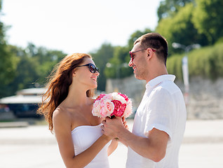 Image showing smiling couple in city