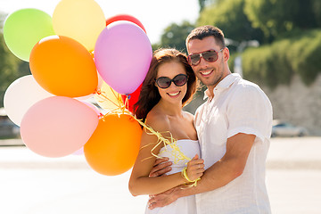 Image showing smiling couple in city