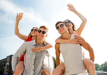 Image showing smiling couple having fun in city