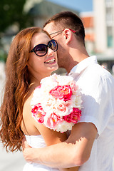 Image showing smiling couple in city