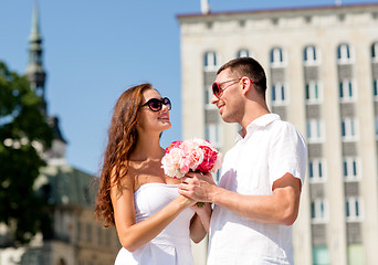 Image showing smiling couple in city