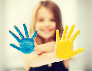 Image showing girl showing painted hands