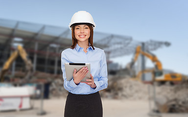 Image showing businesswoman in white helmet