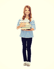 Image showing little student girl with many books