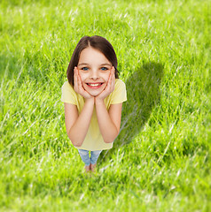 Image showing smiling little girl over white background