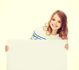 Image showing smiling little girl with blank white board