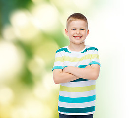 Image showing little boy in casual clothes with arms crossed