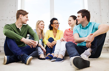 Image showing five smiling teenagers having fun at home