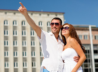 Image showing smiling couple in city