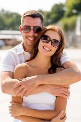 Image showing smiling couple in city