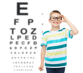 Image showing smiling little boy in eyeglasses