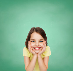 Image showing smiling little girl over white background