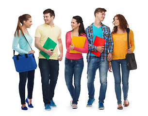 Image showing group of smiling teenagers with folders and bags