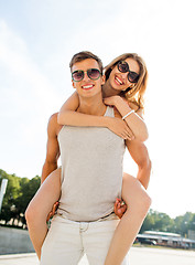 Image showing smiling couple having fun in city