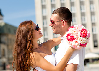 Image showing smiling couple in city