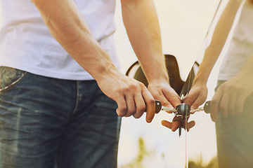 Image showing man with car key outside