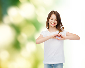 Image showing smiling little girl in white blank t-shirt