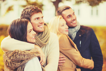 Image showing group of friends having fun in autumn park