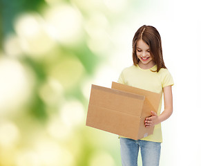 Image showing smiling little girl in white blank t-shirt