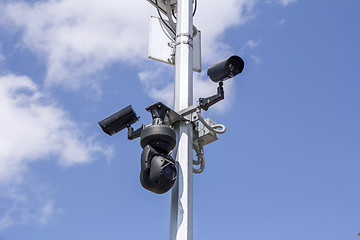 Image showing Three security cameras