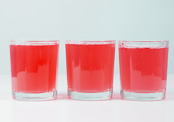 Image showing Pink grapefruit juice