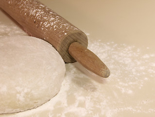 Image showing Rolling Pin, Flour, and Dough