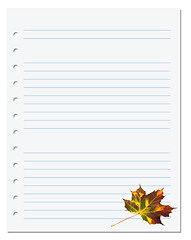 Image showing Notebook paper with autumn maple leaf on white