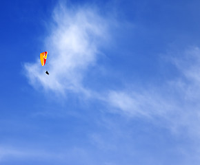 Image showing Skydivers in blue sky at sun day