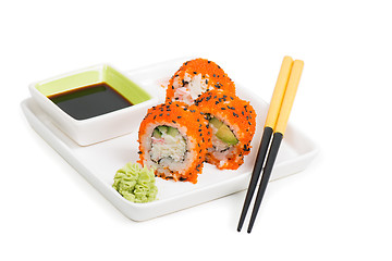 Image showing Maki sushi rolls on the plate with chopsticks