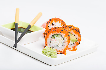 Image showing Sushi rolls with caviar on the plate