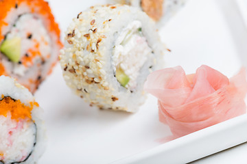 Image showing Rose from ginger and sushi rolls