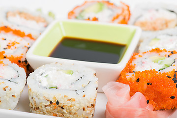 Image showing Soy sauce and sushi mix