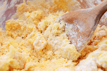 Image showing Creaming butter and icing sugar together 