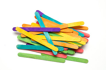 Image showing pile of rainbow colored popsicle sticks